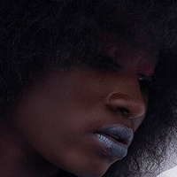 smiley_black_doll Alaston